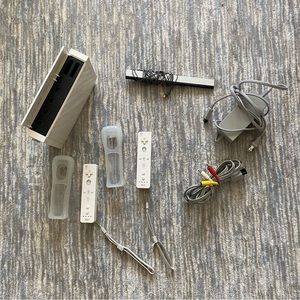 Wii console LIKE NEW and 2 controllers with protectors